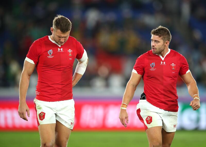 Leigh Halfpenny and Dan Biggar of Wales react as they walk off the pitch following the Rugby World Cup 2019 Semi-Final match between Wales and South Africa at International Stadium Yokohama Kanagawa, Japan. GETTY IMAGES