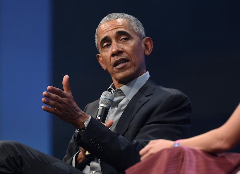 (FILES) In this file photo taken on September 29, 2019, former US President Barack Obama speaks during the "Bits & Pretzels" start-ups and founder congress in Munich, Germany.  Obama has launched a scathing attack on Donald Trump's handling of the coronavirus pandemic, calling it an "absolute chaotic disaster." In a leaked web call may 8, 2020 with former members of his administration, Obama also said the Justice Department's decision to drop charges against Michael Flynn, the former Trump national security adviser who pleaded guilty to lying to the FBI in the Russia probe, endangers the rule of law in the US. / AFP / Christof STACHE
