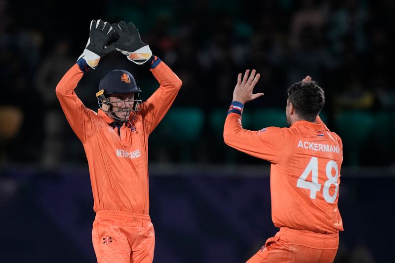 Netherlands captain and wicketkeeper Scott Edwards, left, starred with bat and gloves in the World Cup win over South Africa. AP