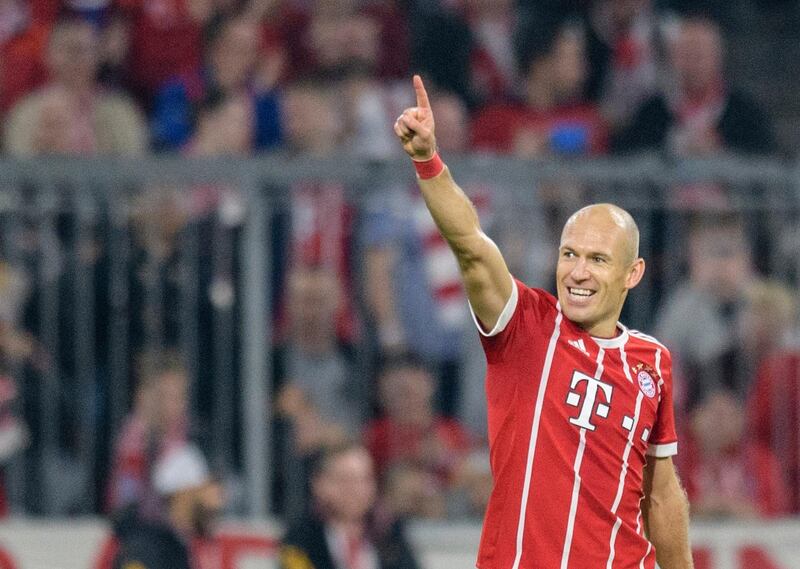 Bayern's Arjen Robben celebrates his side's second goal during the German Soccer Bundesliga match between FC Bayern Munich and VfL Wolfsburg in Munich, Germany, Friday, Sept. 22, 2017. (Matthias Balk/dpa via AP)