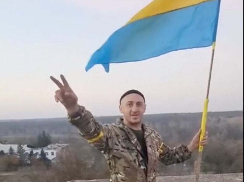 A soldier with the Ukrainian flag in Kalynivske, near Kherson that was retaken by Ukraine on Friday using military equipment supplied by the US. A Republican senator wants greater scrutiny of the $20 billion in aid given to Kyiv. Reuters
