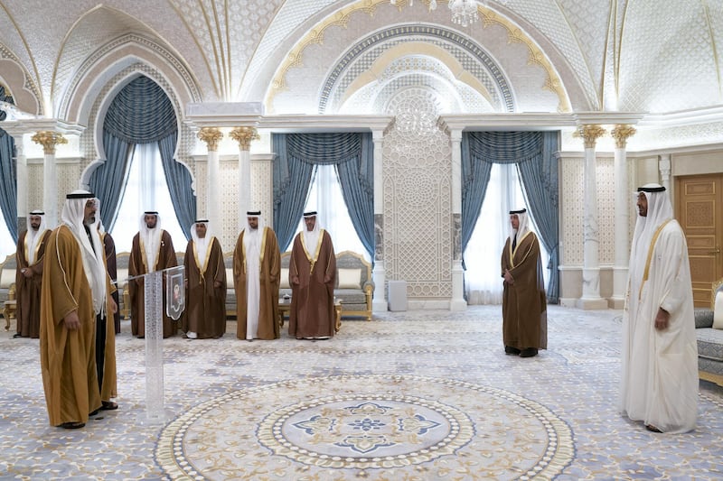 ABU DHABI, UNITED ARAB EMIRATES - March 10, 2019: HH Major General Sheikh Khaled bin Mohamed bin Zayed Al Nahyan, Deputy National Security Adviser (L),  gives his oath during a swearing-in ceremony for new members of the Abu Dhabi Executive Council, at the Presidential Palace. Witnessed by HH Sheikh Mohamed bin Zayed Al Nahyan, Crown Prince of Abu Dhabi and Deputy Supreme Commander of the UAE Armed Forces (R), HH Sheikh Hazza bin Zayed Al Nahyan, Vice Chairman of the Abu Dhabi Executive Council (back 2nd R), HH Sheikh Hamed bin Zayed Al Nahyan, Chairman of the Crown Prince Court of Abu Dhabi and Abu Dhabi Executive Council Member (3rd R), HH Sheikh Diab bin Zayed Al Nahyan (4th R), HE Jassem Mohamed Bu Ataba Al Zaabi, Chairman of Abu Dhabi Executive Office and Abu Dhabi Executive Council Member (4th R), HE Sheikh Abdulla bin Mohamed Al Hamed, Chairman of the Health Department and Abu Dhabi Executive Council Member (5th R) and HE Mohamed Khalifa Al Mubarak, Chairman of the Department of Culture and Tourism and Abu Dhabi Executive Council Member (back L). 

( Mohamed Al Hammadi / Ministry of Presidential Affairs )
---