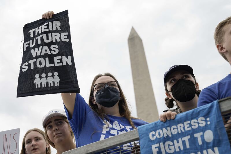 Demonstrators attend a March for Our Lives rally against gun violence an the National Mall in Washington DC on June 11, 2022. AFP