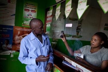 M-Pesa mobile-phone money transfer service in Kenya is one of popular fintech products in Africa. Alamy