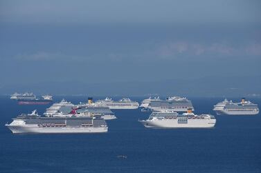 Cruise ships anchored at Manila Bay waiting for disembarkation clearance from the authorities for their Filipino crews. AFP