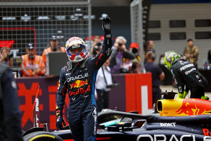 Red Bull's Max Verstappen greets the crowd. Reuters