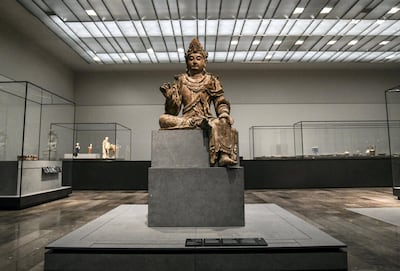 Abu Dhabi, United Arab Emirates - Guanyin, Bodhisattva of Compassion, carved, painted and gilded wood of China, Shanxi province, 1050 - 1150 new arrival on display at the Louvre on November 1, 2018. (Khushnum Bhandari/ The National)
