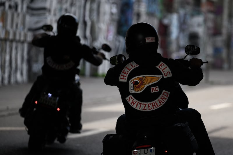 Gang members ride through Bern, Switzerland. AFP