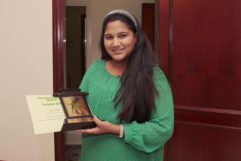 Simran Vedvyas proudly displays her Paryavaran Mitra Award. Jeffrey E Biteng / The National