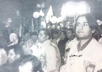 Amir Saadouni, right, a member of the alleged bombing team, at an MEK event. Handout