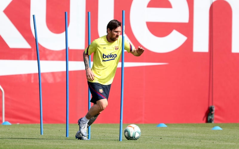 Lionel Messi with the ball during a training session at Joan Gamper sports city in Barca returned to training after 56 days in lockdown,  All pictures AFP/FC Barcelona