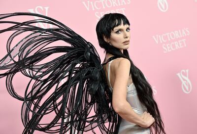 Julia Fox wears 'wings' to the Victoria's Secret New York Fashion Week event. AP