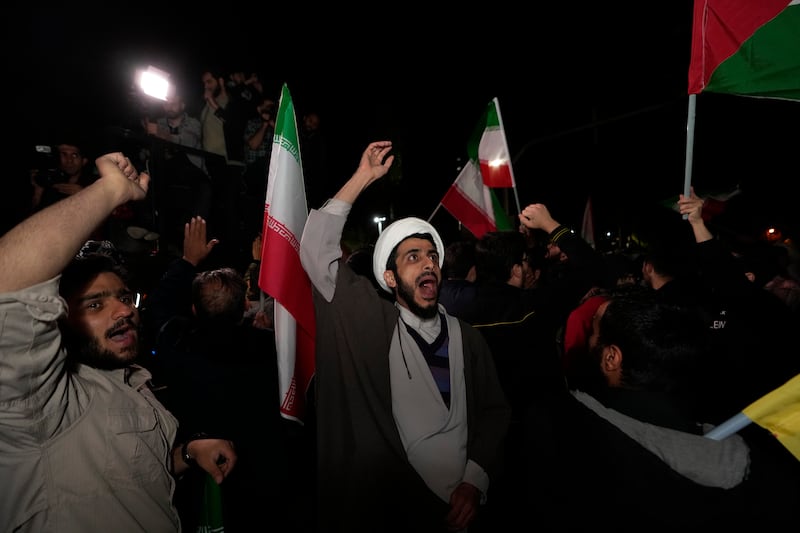 Iranian demonstrators chant slogans during an anti-Israel gathering in Tehran. AP