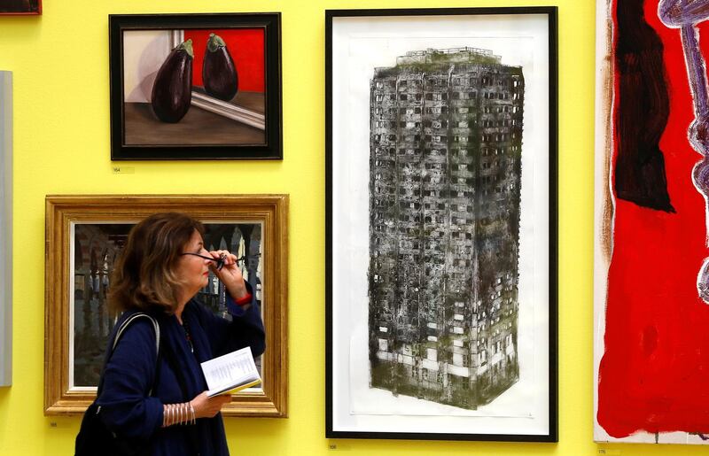 An artwork by Luke wade entitled Five Grand depicting Grenfell Tower is seen amongst other works at the Royal Academy of Arts 250th Summer Exhibition. Peter Nicholls / Reuters