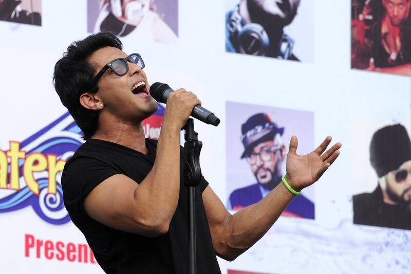 NOIDA, INDIA - JUNE 15: Bollywood actor, music composer and singer Aditya Narayan performs during the live musical concert on June 15, 2014 in Noida, India. (Photo by Burhaan Kinu/Hindustan Times via Getty Images)