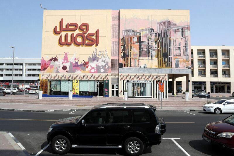 DUBAI , UNITED ARAB EMIRATES, September 20 , 2018 :- Artwork painted by different artists on the wall of Wasl Properties at the Karama shopping complex in Al Karama area in Dubai. ( Pawan Singh / The National )  For Big Picture/Online/Instagram