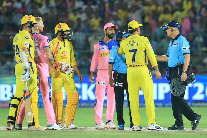 Players of Chennai Super Kings', in yellow, and Rajasthan Royals discuss with umpires over a No Ball during the VIVO IPL T20 cricket match between Rajasthan Royals and Chennai Super Kings in Jaipur, India, Thursday, April 11, 2019. (AP Photo/Vishal Bhatnagar)