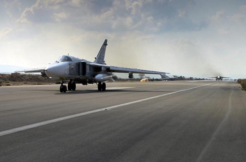 A Russian jet fighter prepares to take off from an airbase in Syria. Russia has warned the US that it will consider coalition aircraft to be targets from now on –but stopped short of threatening to shoot them down. AP Photo /  Russian Defense Ministry Press Service