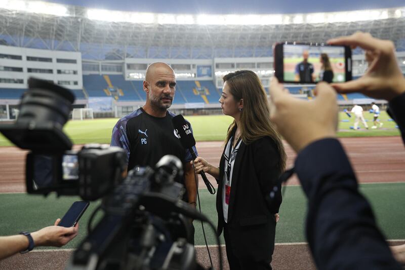 Guardiola is being interviewed after arriving at the Premier League Asia Cup.