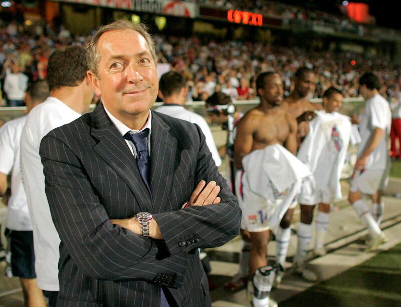 Olympique Lyon's coach Gerard Houllier smiles after winning the Champion of France soccer for the sixth time running at the Gerland stadium in Lyon April 28, 2007.     REUTERS/Robert Pratta (FRANCE)
Picture Supplied by Action Images *** Local Caption *** 2007-04-28T204957Z_01_LYN15_RTRIDSP_3_SOCCER-FRANCE.jpg
