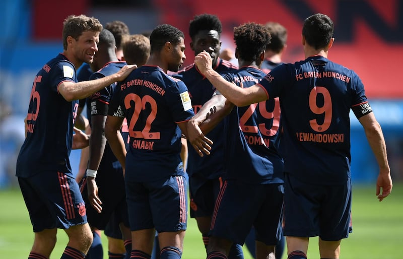 Serge Gnabry celebrates his team's third goal with teammates. Getty Images