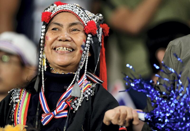 Al Ain, United Arab Emirates - January 14, 2019: Thailand fans before the game between UAE and Thailand in the Asian Cup 2019. Monday, January 14th, 2019 at Hazza Bin Zayed Stadium, Al Ain. Chris Whiteoak/The National