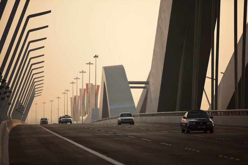 November 28, 2010 - Abu Dhabi, UAE -   Motorists drive across Sheikh Zayed Bridge on Sunday November 28, 2010.  The Sheikh Zayed Bridge in Abu Dhabi is now officially open.  The 842-metre construction, opened by Sheikh Khalifa last night, is the fourth bridge to link Abu Dhabi to the mainland.    (Andrew Henderson/The National)