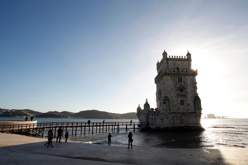 LISBON, PORTUGAL - DECEMBER 23:  Belem Tower is seen on December 23, 2013 in Lisbon, Portugal.   The tower is a fortified tower located in the civil parish of Santa Maria de Belem in the municipality of Lisbon, Portugal. It is a UNESCO World Heritage Site (along with the nearby JerÃ³nimos Monastery) because of the significant role it played in the Portuguese maritime discoveries of the era of the Age of Discoveries.  (Photo by Pedro Loureiro/Getty Images)