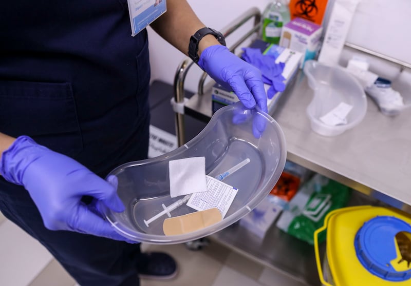 A nurse prepares the vaccine kit at Seha Vaccination Centre, Abu Dhabi Cruise Terminal, Zayed Port.