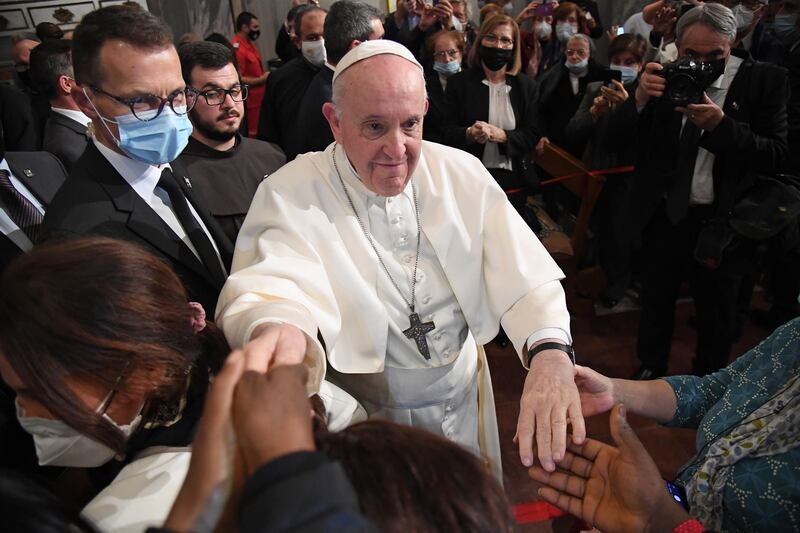 Pope Francis holds an ecumenical prayer with migrants. EPA
