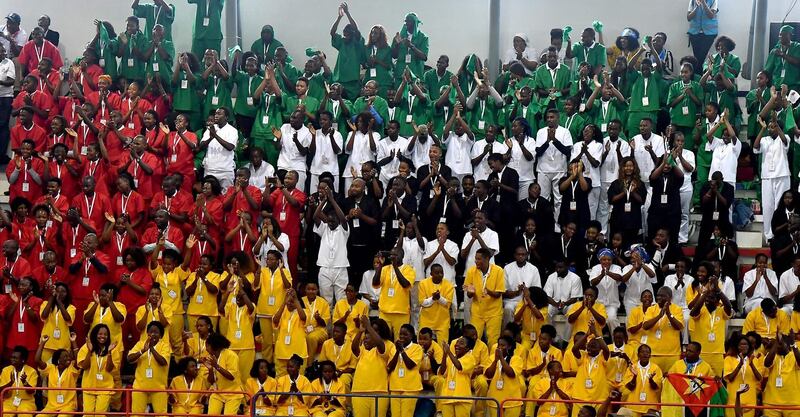Youth clap the hands during a meeting with Pope Francis at the Interreligious meeting with the Youth at the Maxaquene Pavillion in Maputo.  AFP