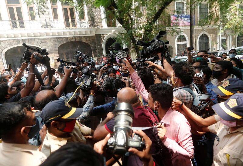Media personnel surround Bollywood actor Rhea Chakraborty as she arrives at Narcotics Control Bureau (NCB) office for questioning, following the death of her boyfriend and actor Sushant Singh Rajput, in Mumbai, India, September 6, 2020. Picture taken September 6, 2020. REUTERS/Francis Mascarenhas