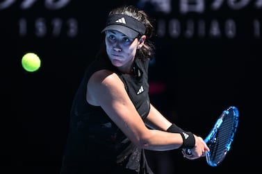 Garbine Muguruza of Spain in action against Elise Mertens of Belgium during their first round singles match at the 2023 Australian Open tennis tournament at Melbourne Park in Melbourne, Australia, 17 January 2023.   EPA / JOEL CARRETT  AUSTRALIA AND NEW ZEALAND OUT