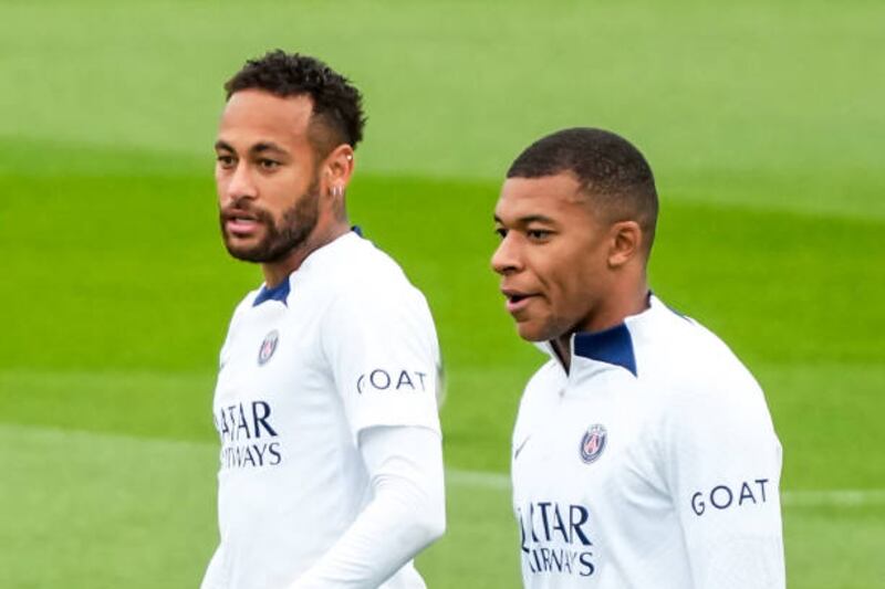 NEYMAR JR of Paris Saint Germain (PSG) and Kylian MBAPPE of Paris Saint Germain (PSG) during the Paris Saint-Germain Training and Press Conference at Ooredoo Center on August 19, 2022 in Paris, France. (Photo by Hugo Pfeiffer / Icon Sport via Getty Images)