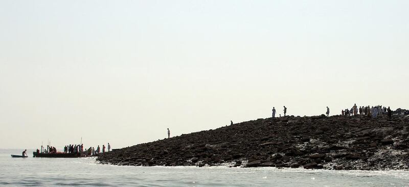 Mohammed Danish, a marine biologist from Pakistan’s National Institute of Oceanography, said a team of experts had visited the island and found methane gas rising. AFP PHOTO / Behram Baloch