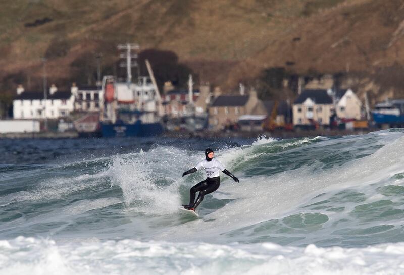 A competitor during the practice session on Day 1 of the British Surfing Championships at Thurso East, Caithness on Saturday, April 10. PA