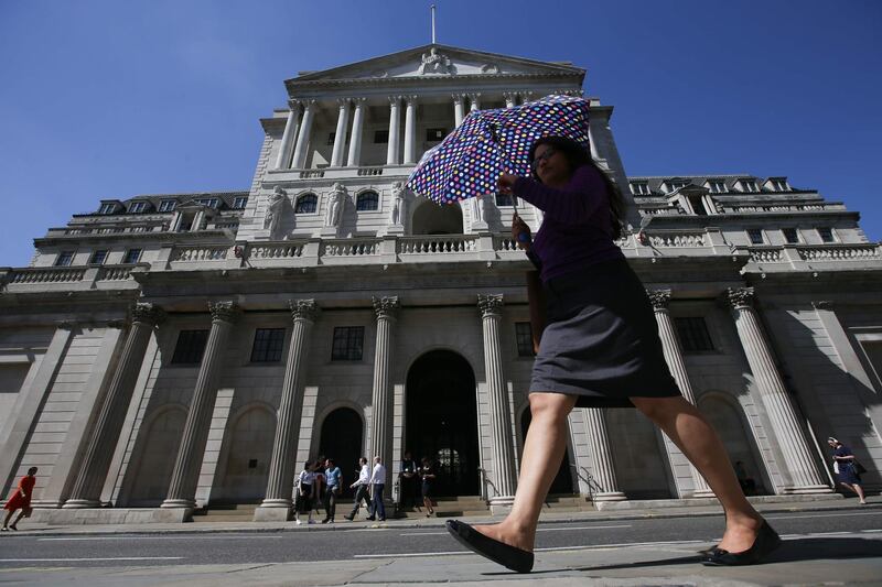 (FILES) In this file photo taken on August 02, 2018 Pedestrians walk past the Bank of England in the City of London on August 2, 2018. Europe's financial system faces "potential risks" to its stability arising from a no-deal Brexit, the Bank of England warned on March 5, 2019, as it extended its weekly lending facilities to include euros. / AFP / Daniel LEAL-OLIVAS
