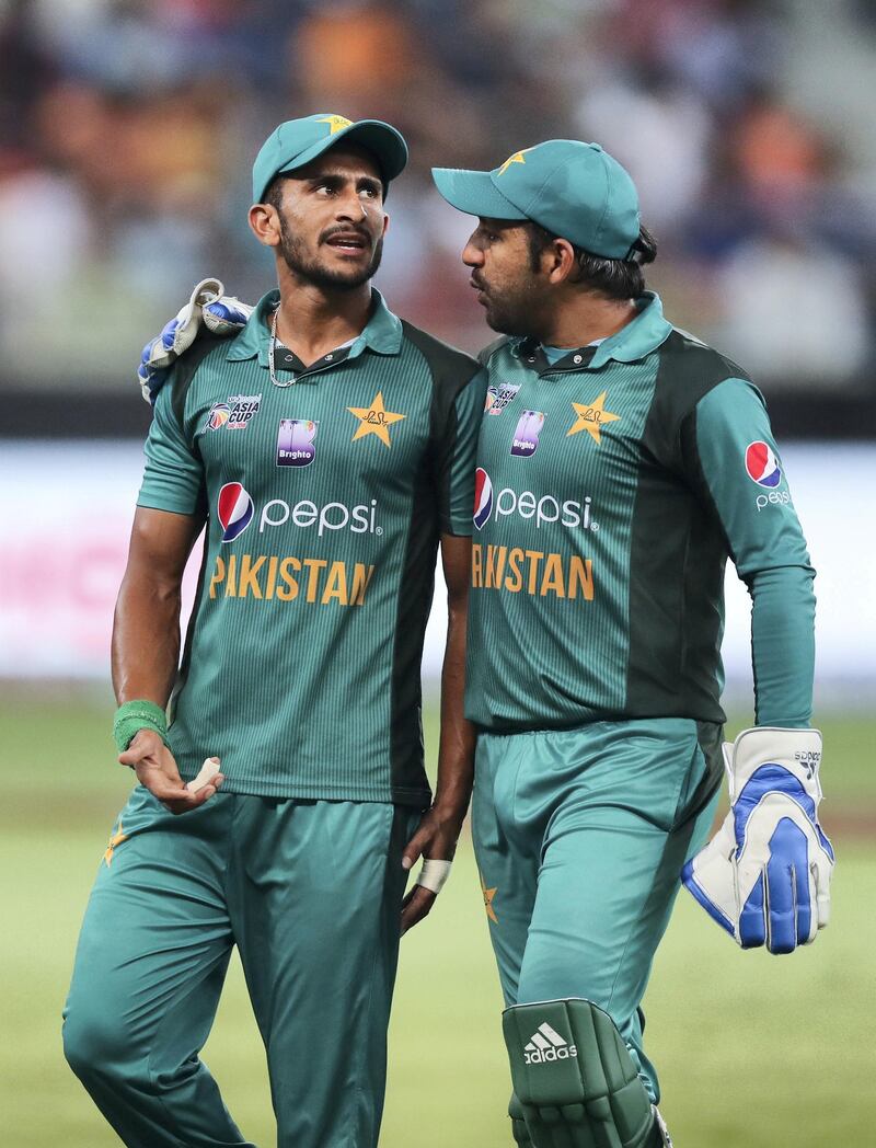 Dubai, United Arab Emirates - September 23, 2018: Pakistan captain Sarfraz Ahmed (R) has a word with his bowler Hasan Ali during the game between India and Pakistan in the Asia cup. Sunday, September 23rd, 2018 at Sports City, Dubai. Chris Whiteoak / The National