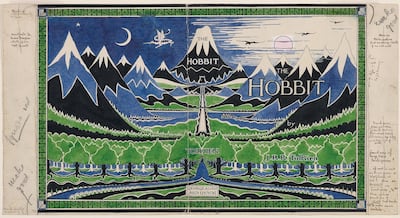 The final design of The Hobbit dust jacket. Tolkien not only illustrated The Hobbit but was also closely involved in its production process, designing the dust jacket and the binding. Tolkien’s notes can be seen around the outside of the image. He was keen to use four colours: green, blue, black and red but this was too expensive and the publisher had the final say in the left-hand margin, ‘Ignore red’.