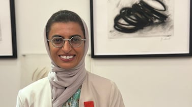 Minister of State Noura Al Kaabi with her Legion of Honour medal on Tuesday. Wam