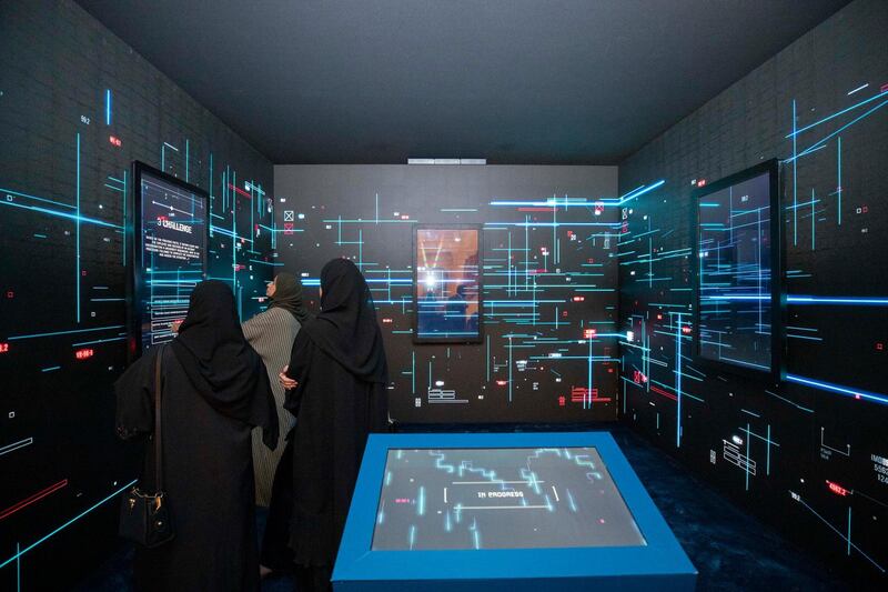 Attendees testing their cyber threat management skills at a special corner called ‘Cyber Cube’ at the Global Cybersecurity Forum at Riyadh's Ritz Carlton hotel. Courtesy NCA