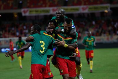 Cameroon striker Choupo-Moting celebrates with teammates after scoring in the World Cup qualifer against Mozambique. AFP