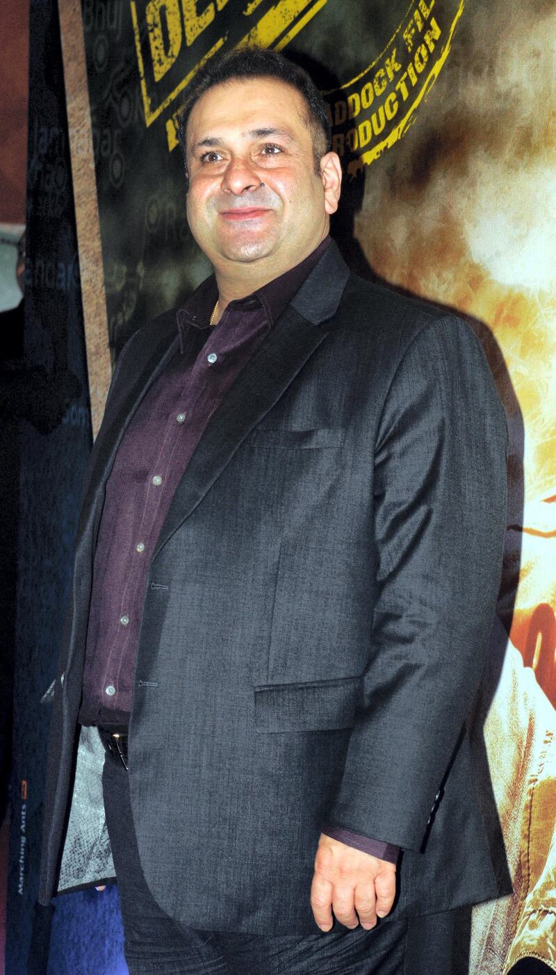 Indian Bollywood film actor Rajiv Kapoor attends the music launch of the upcoming Hindi film 'Lekar Hum Deewana Dil' written and directed by Arif Ali, in Mumbai on June 12, 2014.   AFP PHOTO (Photo by STR / AFP)
