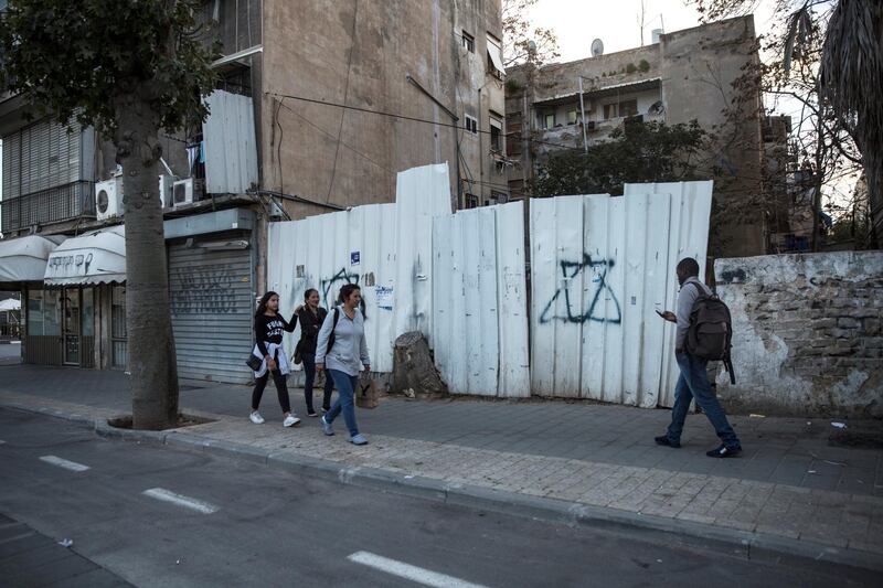 Two Stars of David are seen on a tin fence in south Tel Aviv which has become home to thousands of migrant workers and thousands of African political asylum seekers mainly from Eritrea and Sudan .Photo by Heidi Levine for The National 