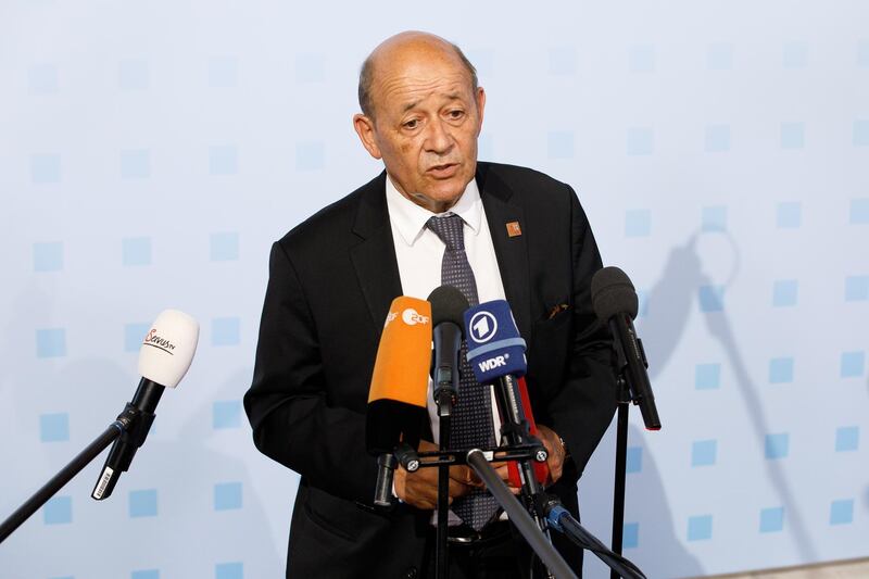 epa06984010 French Foreign Minister Jean-Yves Le Drian talks to the media as he arrives for the informal meeting of European Union foreign affairs ministers at the Hofburg Palace in Vienna, Austria 30 August 2018. Austria hosts a two-day informal meeting of foreign affairs ministers in Vienna on 30 and 31 August. Austria took over its third Presidency of the European Council from July 2018 until December 2018.  EPA/FLORIAN WIESER