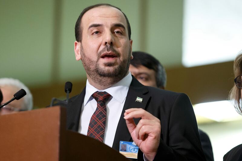 FILE -- In this March 3, 2017 file photo,  Nasr al-Hariri, the leader of Syria's main opposition group, the High Negotiations Committee, gives a press conference after a round of negotiation with UN Special Envoy of the Secretary-General for Syria Staffan de Mistura, at the European headquarters of the United Nations in Geneva, Switzerland. Syria's opposition is gathering in Saudi Arabia hoping to close ranks ahead of new negotiations starting Wednesday, Nov. 22, 2017, but they are a house divided in ways that enhance Syrian President Bashar Assad's upper hand. Hours before the meeting, a dozen opposition figures resigned. (Salvatore Di Nolfi/Keystone via AP, File)