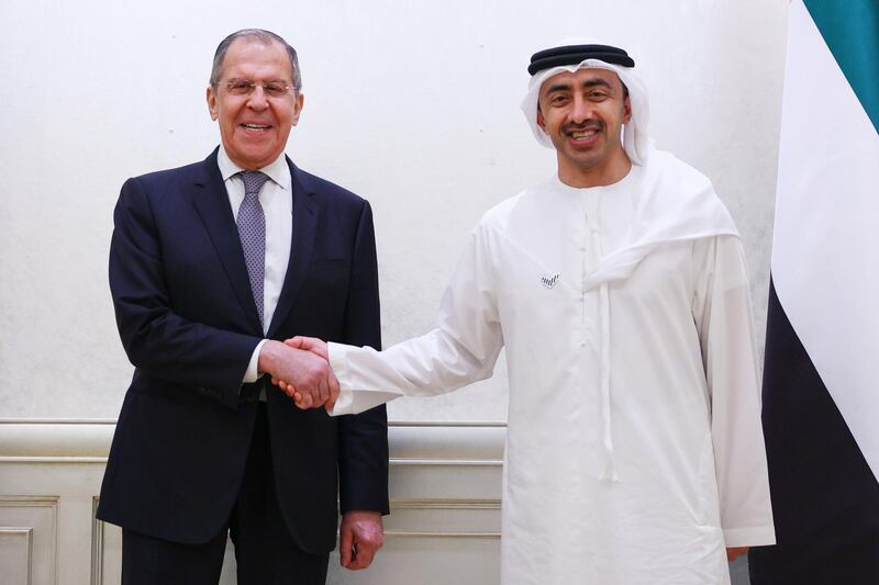 ABU DHABI, UNITED ARAB EMIRATES - MARCH 9, 2021: Russia's Foreign Minister Sergei Lavrov (L) and his Emirati counterpart Abdullah bin Zayed bin Sultan Al Nahyan shake hands during a meeting. Russian Ministry of Foreign Affairs/TASS.No use Russia. TASS / Reuters