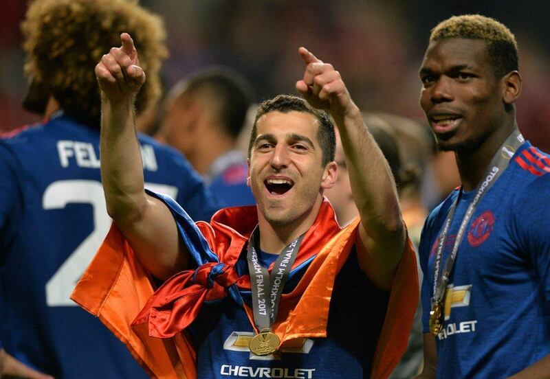 Manchester United goalscorers Henrikh Mkhitaryan and Paul Pogba celebrate. Peter Powell / EPA