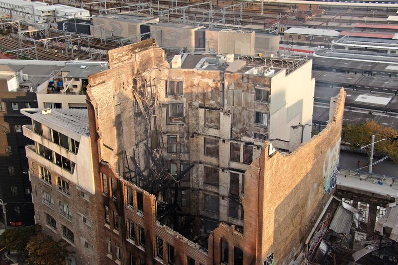  Two 13-year-olds turned themselves over to police after a blaze gutted a seven-storey heritage building in central Sydney. AFP