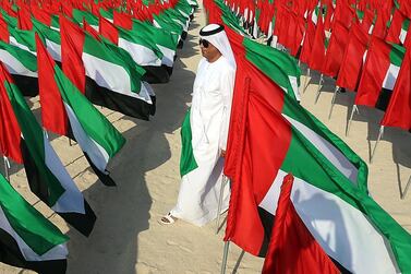 UAE citizens and residents will hoist the country’s flag high at 11am on November 3 in celebration of Flag Day. Satish Kumar for The National